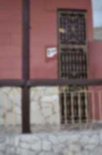 Número de casa con palma